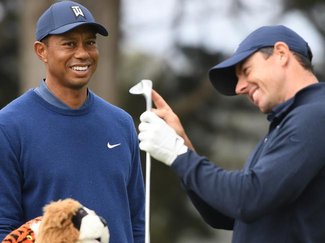 SAN FRANCISCO, CALIFORNIA - AUGUST 06: Tiger Woods of the United States talks with Rory McIlroy of Northern Ireland on the fourth tee during the first round of the 2020 PGA Championship at TPC Harding Park on August 06, 2020 in San Francisco, California. (Photo by Harry How/Getty Images)