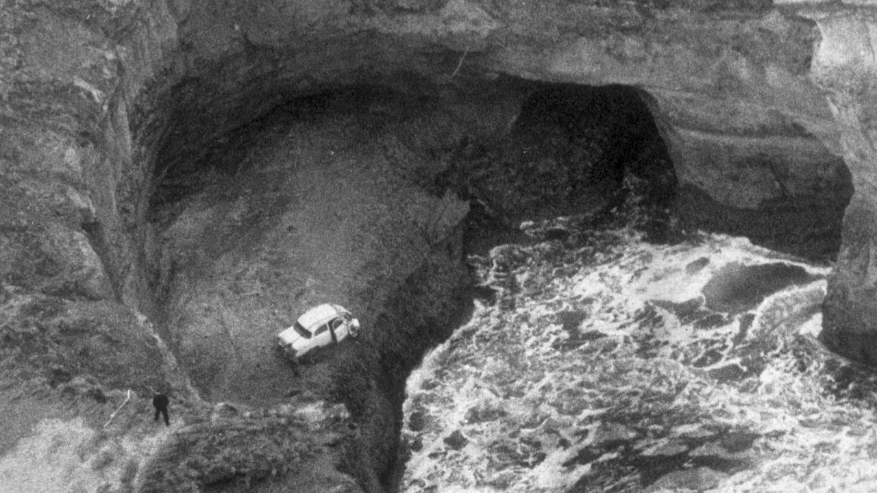 The car with the bodies of Therese Crawford and her children on a ledge in Loch Ard Gorge.