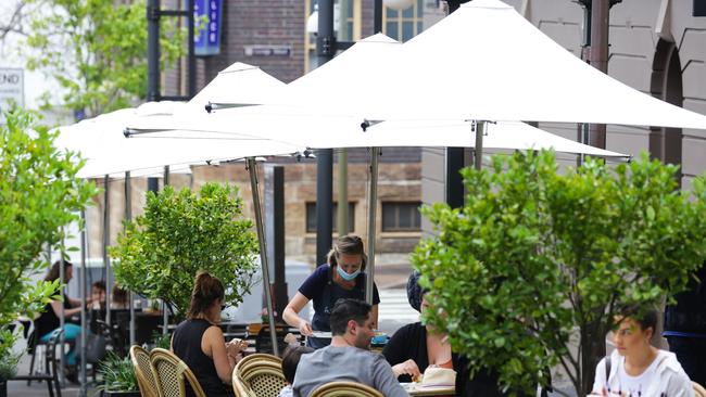 Mark Star was able to provide umbrellas as many cafes and restaurants set up outdoor dining areas. Picture: Gaye Gerard