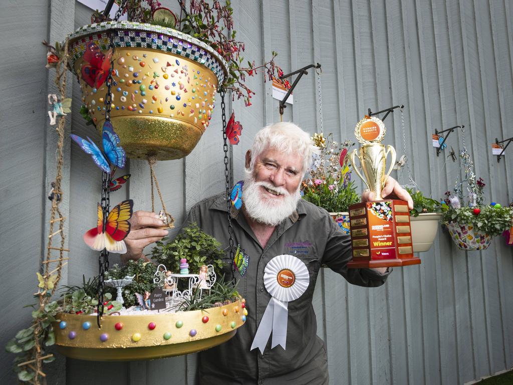 tewart Dorman of Glenvale Villas shows his excitement as the retirement village is named the joint People's Choice winner. Picture: Kevin Farmer