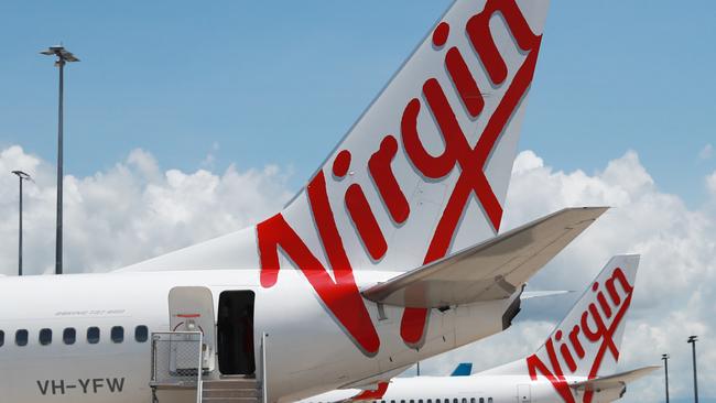 A Virgin Australia Boeing 737 passenger jet aircraft on the tarmac apron at Cairns Airport. Picture: Brendan Radke