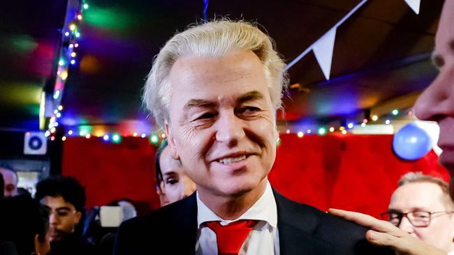 TOPSHOT - PVV leader Geert Wilders reacts to the results of the House of Representatives elections in Scheveningen, the Netherlands, 22 November 2023. The far-right, anti-Islam party of firebrand politician Geert Wilders has won a stunning victory in the Dutch election, partial results showed Wednesday, a political bombshell that will resound in Europe and around the world. (Photo by Remko de Waal / ANP / AFP) / Netherlands OUT - Belgium OUT