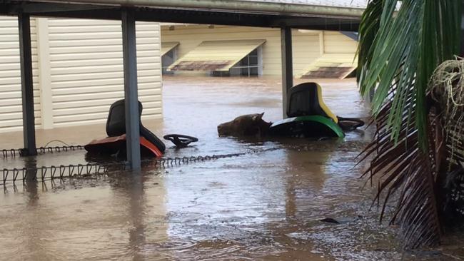 A cow floats among lawnmowers at Our Lady Help of Christians Primary School in South Lismore on February 28, 2022.