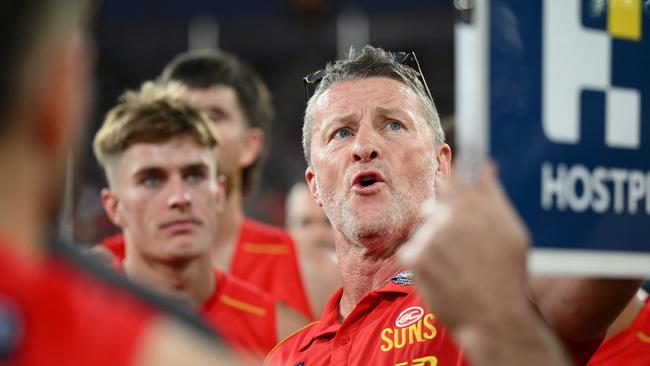 Damien Hardwick, Senior Coach of the Suns speaks to his players on the field during the round 16 AFL match against the Collingwood Magpies at People First Stadium. (Photo by Matt Roberts/AFL Photos/via Getty Images)