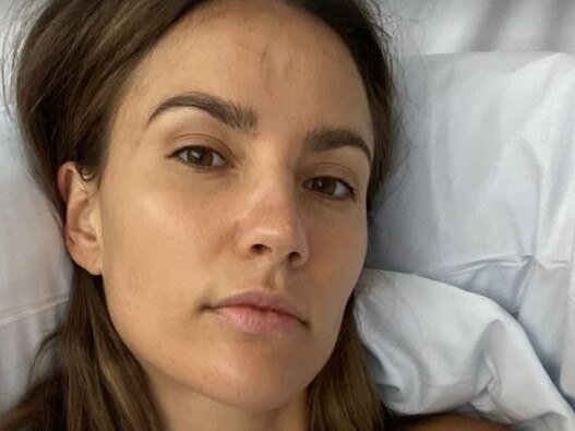 Model mum recovers after breast implant removal surgery