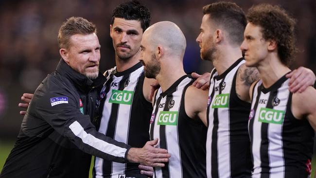 Magpies head coach Nathan Buckley wishes players good luck before the qualifying final. Picture: AAP Image/Michael Dodge