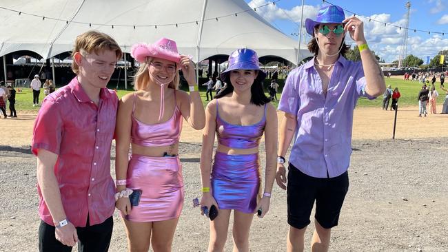 This quartet got their glow on with sparkling cowboy hats.