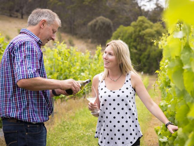 Winemaker Claudio Radenti serves wine to a guest at his Freycinet Vineyard, on Tasmania's East Coast. Picture: Tourism Tasmania/Rob Burnett