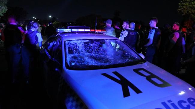 A police car damaged on Monday night. Picture: Liam Mendes