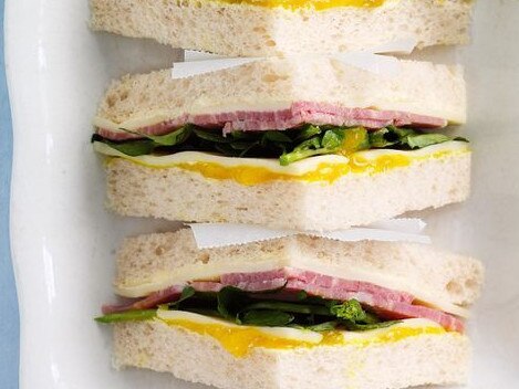 Corned beef, watercress and pickle sandwiches.