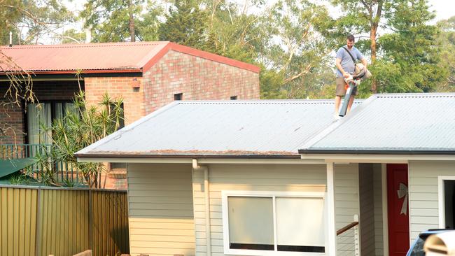 Residents prepare their properties and to leave as bushfires threaten their homes. Picture: Jeremy Piper