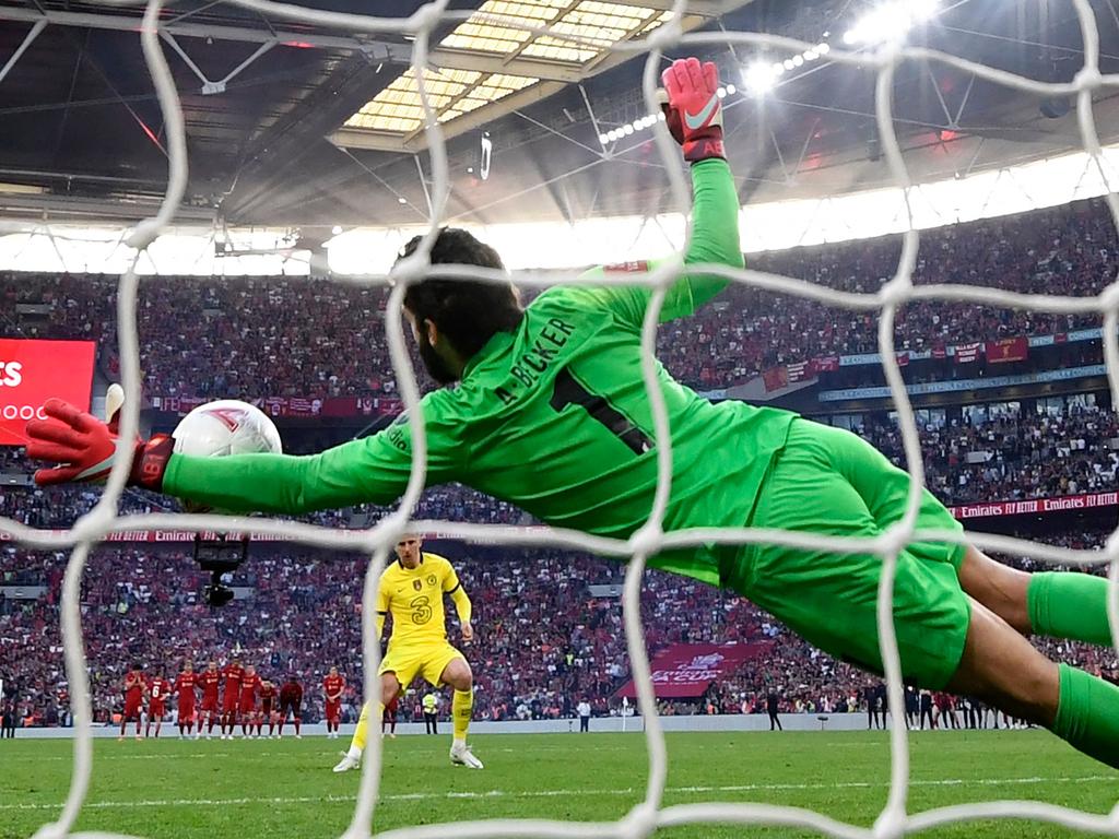 Liverpool goalkeeper Alisson Becker saves the shot by Chelsea midfielder Mason Mount that decided the FA Cup at the end of a penalty shootout. Picture: Glyn Kirk/AFP