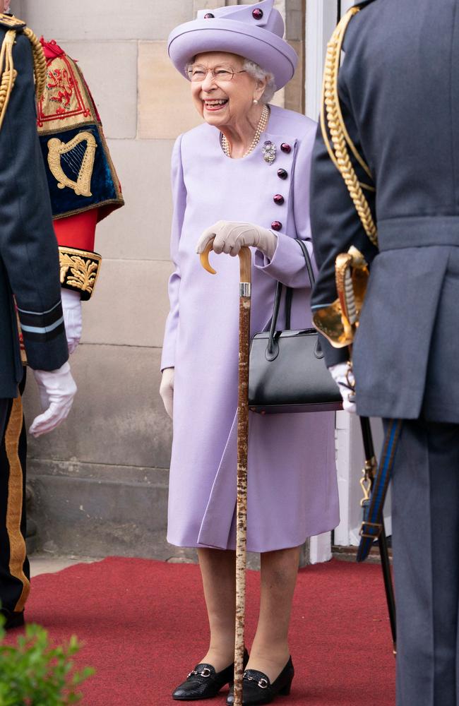 The violet hue had special significance to the location. Picture: AFP