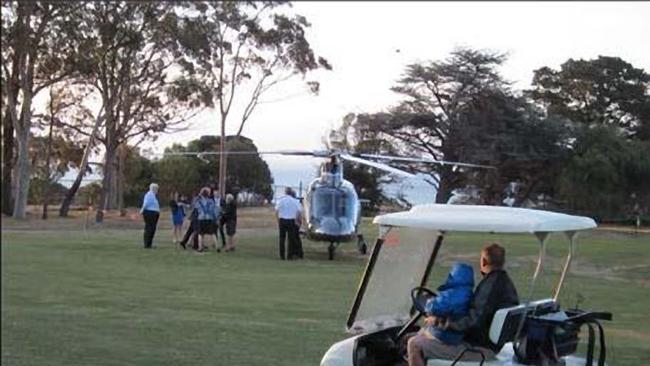 An expensive ride: Federal Speaker Bronwyn Bishop landing in a helicopter at a Geelong Golf Club.