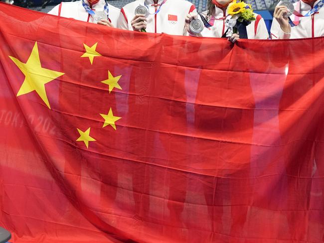 Chinese swimming medallists at the Tokyo 2021 Olympic Games. The nearly two dozen swimmers cited escaped punishment. Picture: Du Yang/China News Service via Getty Images