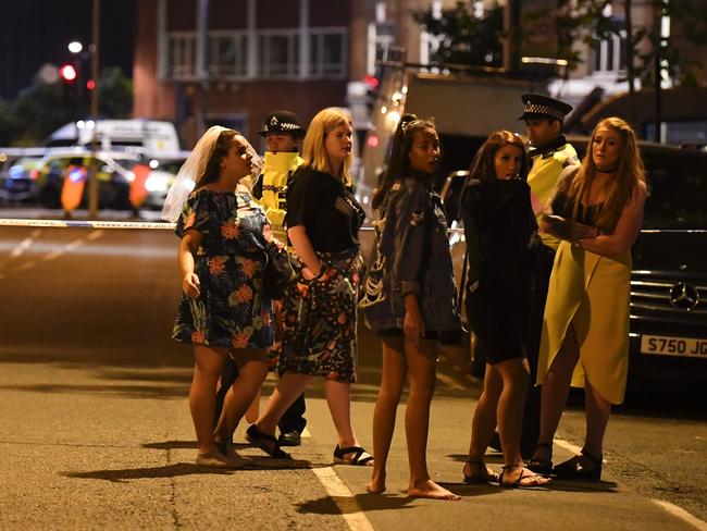 Women stand at a police cordon set up in London following a terrorist attack on London Bridge. Picture: AFP