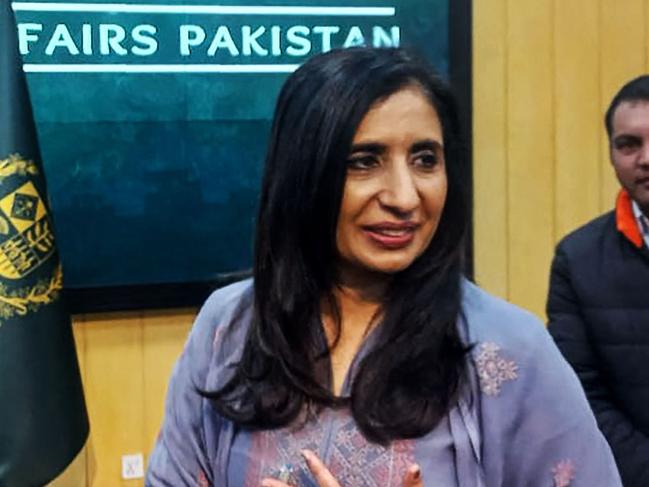 Pakistan's Ministry of Foreign Affairs spokeswoman Mumtaz Zahra Baloch (C) interacts with journalist after media briefing in Islamabad on January 18, 2024. Pakistan on January 18 said it carried out strikes against militant targets in Iran, with Tehran reporting a death toll of nine civilians after staging its own air raid in Pakistan earlier this week. Nuclear-armed Pakistan and neighbouring Iran are both battling simmering insurgencies along their sparsely populated border regions. (Photo by Zain Zaman JANJUA / AFP)