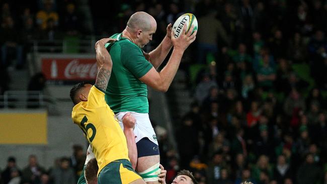 Wallabies fullback Israel Folau loses an aerial challenge against Ireland.