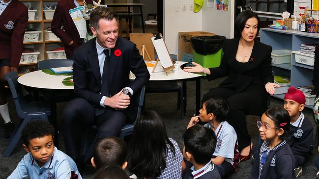 SYDNEY, AUSTRALIA : NewsWire Photos - NOVEMBER 11 2024; Premier for NSW, Chris Minns and Minister for Education, Prue Car join the Member for Parramatta, Donna Davis at Rosehill Public School in classroom D for story time ahead of a press conference to discuss the results of the 2024 Alternative Supervision Survey. Picture: NewsWire / Gaye Gerard