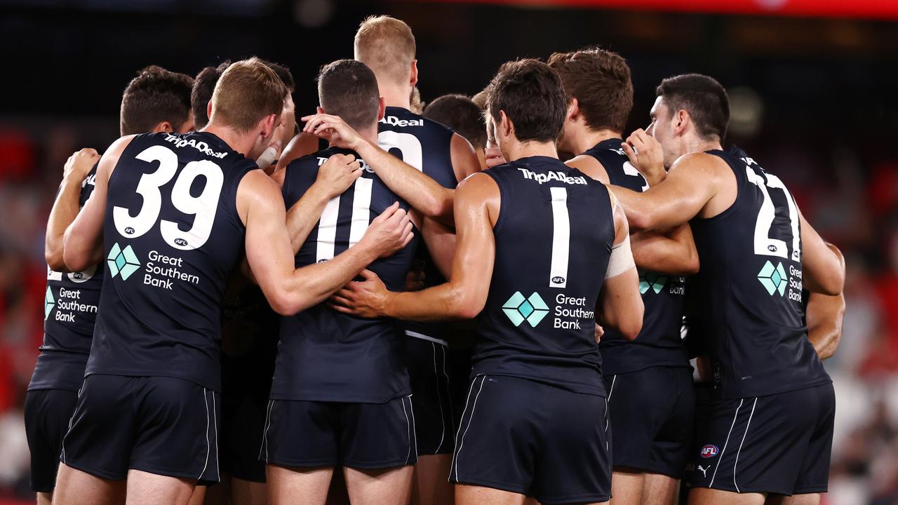 Carlton in a tight huddle. Picture: Michael Klein