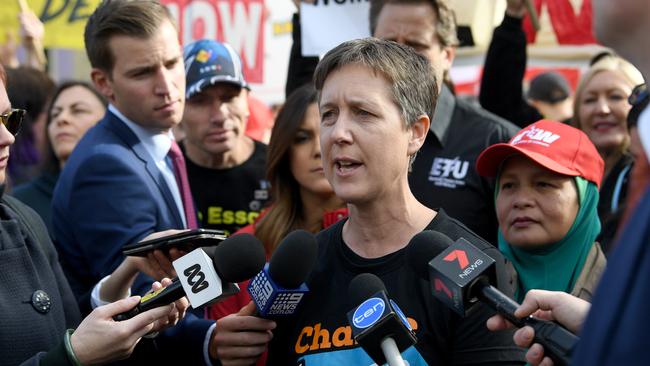 Australian Council of Trade Unions (ACTU) Secretary Sally McManus speaks to the media as union workers protest for better pay and more secure jobs in Melbourne, Wednesday, May 9, 2018. Thousands of workers have blocked off part of Melbourne's CBD, saying Prime Minister Malcolm Turnbull can keep the federal coalition's slated tax cuts for low- and middle-income workers. The rally on Wednesday is part of a nationwide campaign demanding better work conditions and pay. (AAP Image/Joe Castro) NO ARCHIVING