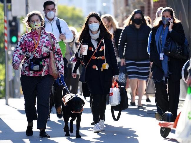 Southeast Queenslanders will continue to wear masks for at least another week. Picture: NCA NewsWire / Dan Peled