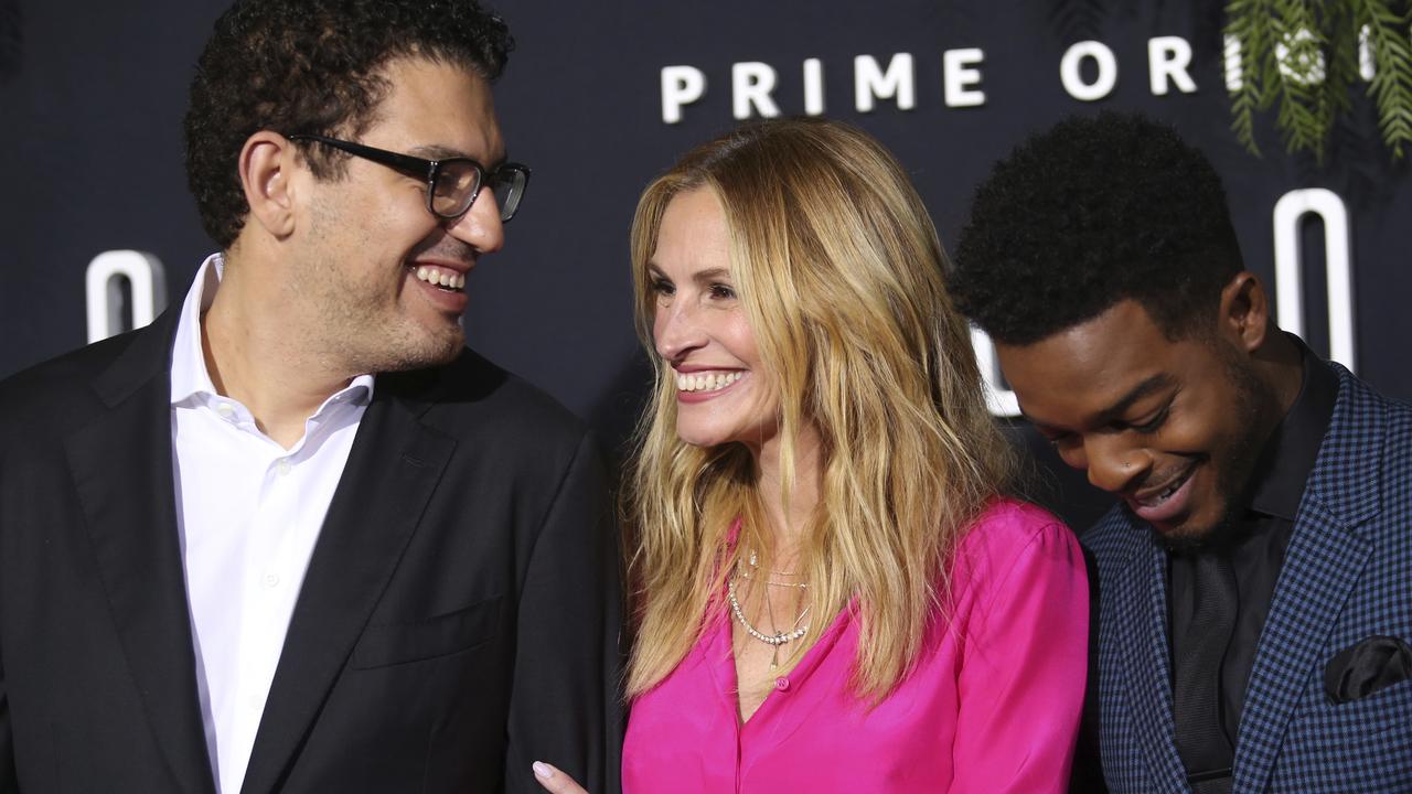 Esmail and Roberts at the Homecoming premiere, with cast member Stephan James. Picture: Danny Moloshok/Invision/AP