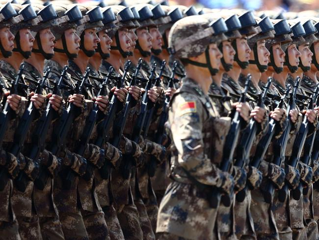 --FILE--Chinese PLA (People's Liberation Army) soldiers march past the Tian'anmen Rostrum during the military parade to commemorate the 70th anniversary of the victory in the Chinese People's War of Resistance Against Japanese Aggression in Beijing, China, 3 September 2015.After enduring the smallest budget increase in six years, China's military is looking to beef itself up with spending set to jump up to $233 billion by 2020. The 2020 Chinese defense budget will signify a 60% increase from this year's budget of a mere $146 billion, and it will be almost double the $123 billion budget of 2010, according to report by IHS Jane's, a British publishing company specializing in military information. The increased budget is partially explained as a response to increasing regional tensions stemming from territorial disputes in the South China Sea that most recently saw the \\"unlawful seizure\\" of a US Navy underwater drone and apparent military installations popping up on artificial islands in the sea, in a move that China's Defense Ministry has cast as arming the \\"slingshot\\" against an aggressor \\"flexing his muscles outside [the] door.\\" \\"A key trend in [the Asia-Pacific region] is the shift from a traditional focus on territorial defense towards power projection,\\" said principal analyst at IHS Jane's Craig Caffrey to CNN. \\"This is new for the region and is likely to increase military-to-military contact between states.\\" Spending for China's military increased by just 7.6% this year, a far cry from the double-digit increases that had been the norm for a number of years. The last single-digit increase in Chinese military spending was 7.5% back in 2010.