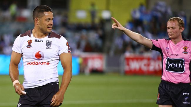 Jarryd Hayne of Fiji walks from the field after being sin binned.