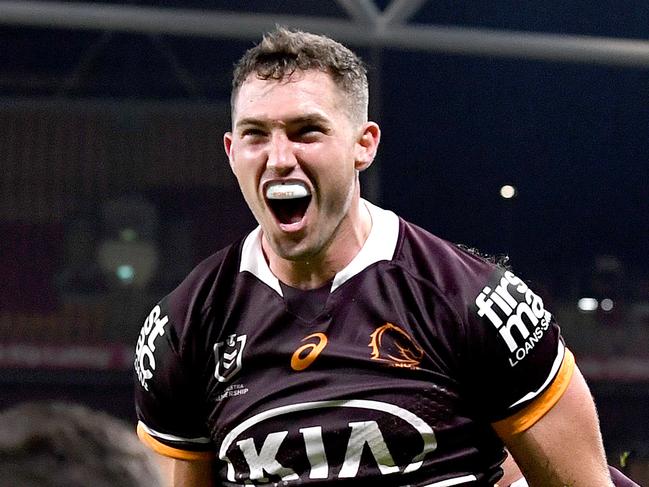 BRISBANE, AUSTRALIA - APRIL 30: Corey Oates of the Broncos celebrates scoring a try during the round 8 NRL match between the Brisbane Broncos and the Gold Coast Titans at Suncorp Stadium, on April 30, 2021, in Brisbane, Australia. (Photo by Bradley Kanaris/Getty Images)