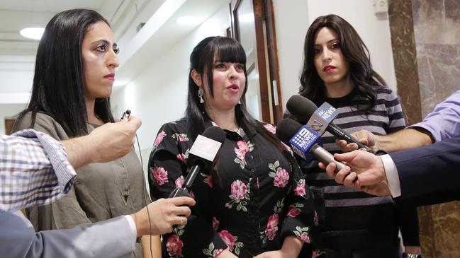 Dassi Erlich with her sisters Elly Sapper (left) and Nicole Meyer outside the Jerusalem court. The sisters have been campaigning for Malka Leifer to face justice. Picture: Ella Pellegrini