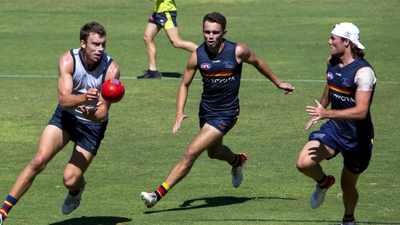 The white team and blue team face off at Adelaide match simulation. Picture: Emma Brasier