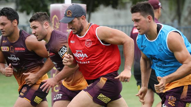 Gillett rips in at Broncos training. Picture: Liam Kidston