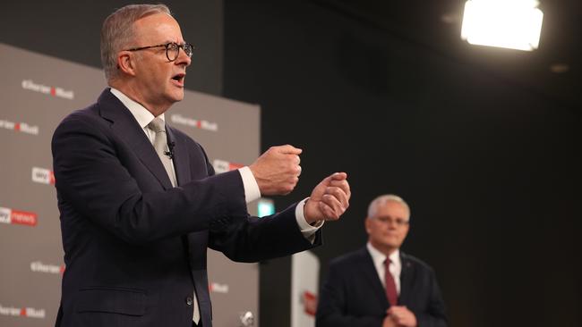 Anthony Albanese (L) and Scott Morrison attend the first leaders' debate. Picture: Getty Images.