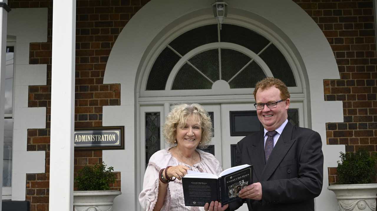 Author Felicity McArdle and St Mary's principal Michael Newman with the book God Old Boys:. Picture: Bev Lacey