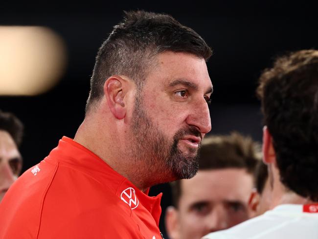 MELBOURNE, AUSTRALIA - MAY 10: Dean Cox, Head Coach of the Swans speaks to players at quarter time during the round nine AFL match between Essendon Bombers and Sydney Swans at Marvel Stadium, on May 10, 2025, in Melbourne, Australia. (Photo by Morgan Hancock/Getty Images)