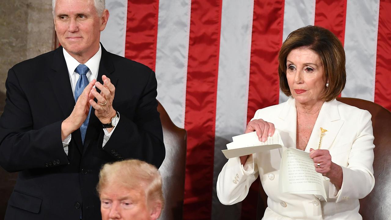 Nancy Pelosi ripping up Mr Trump’s speech. Picture: Mandel Ngan/AFP