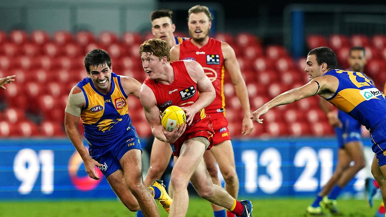 AFL 2020: Gold Coast boss Mark Evans car swap with Suns staffer Craig ...