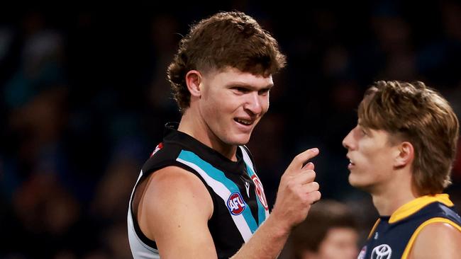 ADELAIDE, AUSTRALIA - AUGUST 20: Mitch Georgiades of the Power celebrates a goal during the 2022 AFL Round 23 match between the Port Adelaide Power and the Adelaide Crows at Adelaide Oval on August 20, 2022 in Adelaide, Australia. (Photo by James Elsby/AFL Photos via Getty Images)