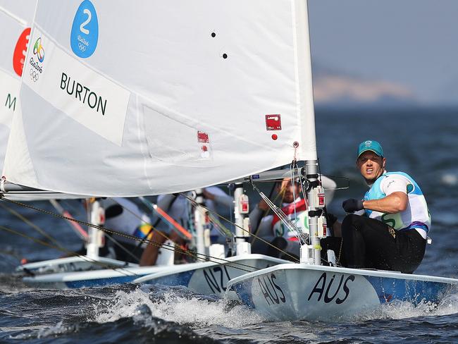Australia's Tom Burton wins the gold medal in the Laser Men Medal Race at Marina da Gloria during day 11 of the Rio 2016 Olympic Games. Picture: Brett Costello