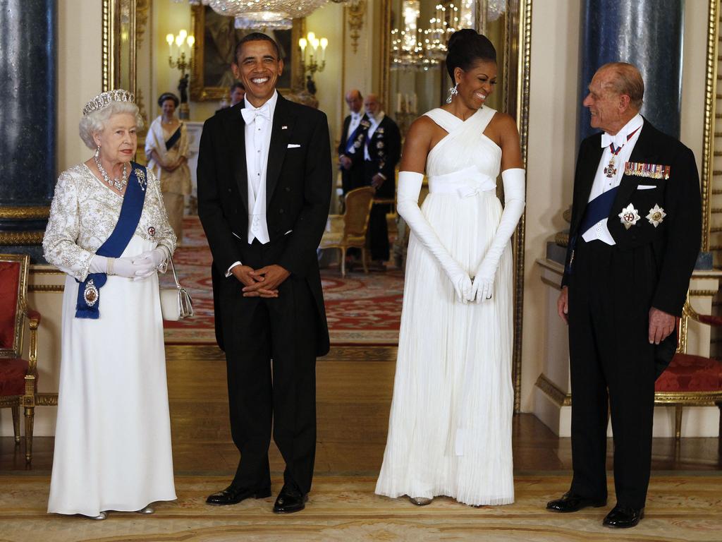 (Britain's Queen Elizabeth II (L) and US President Barack Obama (2ndL) pose with US First Lady Michelle Obama (2ndR) and Prince Philip (R), Duke of Edinburgh, in the Music Room of Buckingham Palace ahead of a State Banquet on May 24, 2011 in London, England. Picture: AFP