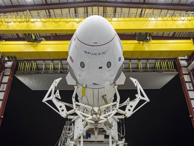 TOPSHOT - In this image released by Space X, the Crew Dragon spacecraft and the SpaceX Falcon 9 rocket are pictured at Launch Complex 39A on May 21, 2020, as preparations continue for the Demo-2 mission at NASA's Kennedy Space Center in Florida. - The Crew Dragon will take off from Kennedy on May 27 with help from SpaceX's Falcon 9 rocket and dock at the ISS. (Photo by - / SPACEX / AFP) / RESTRICTED TO EDITORIAL USE - MANDATORY CREDIT "AFP PHOTO / SPACE X " - NO MARKETING - NO ADVERTISING CAMPAIGNS - DISTRIBUTED AS A SERVICE TO CLIENTS