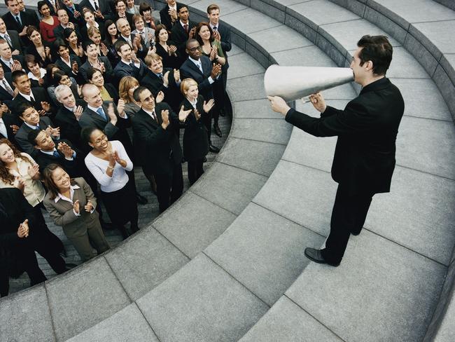 140620 DEAL Businessman Standing on Steps Outside Talking Through a Megaphone, Large Group of Business People Listening and Applauding pic ; thinkstock Picture: Captioned As