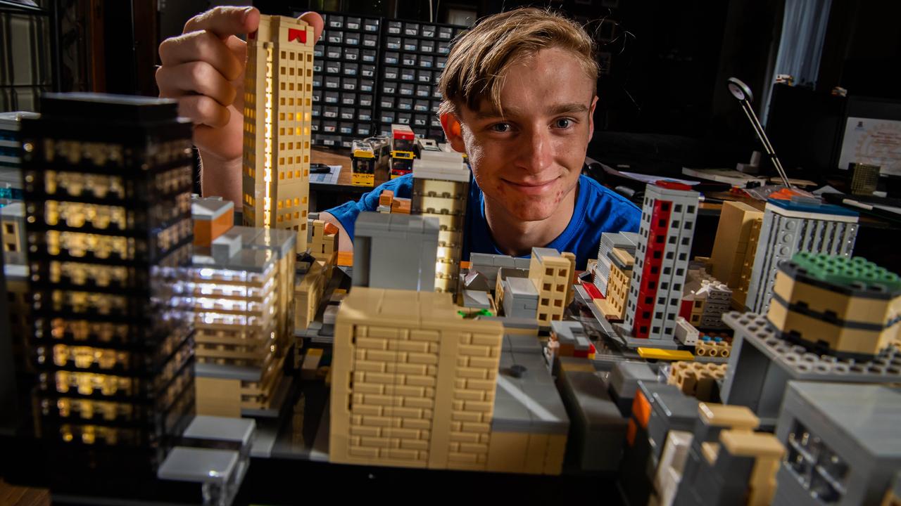 Connor puts the finishing touches on his model of the Adelaide skyline. Picture: Tom Huntley