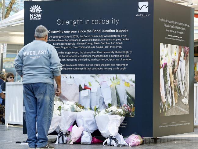 A member of the public looks at the Commemorative Boards in Oxford Street Mall, Bondi Junction, to mark the 1st anniversary of the knife attack. Picture: NewsWire/John Appleyard