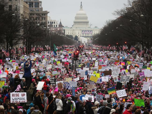 Protesters walk up Pennsylvania Avenue during the Women's March on Washington, with the US Capitol in the background, on January 21, 2017. Picture: Mario Tama/Getty Images/AFP