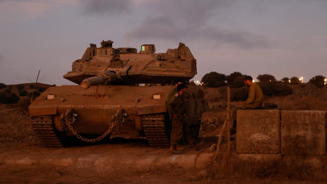 Israeli soldiers gather near the Israeli-annexed Golan Heights on Thursday. Picture: Jalaa Marey/AFP