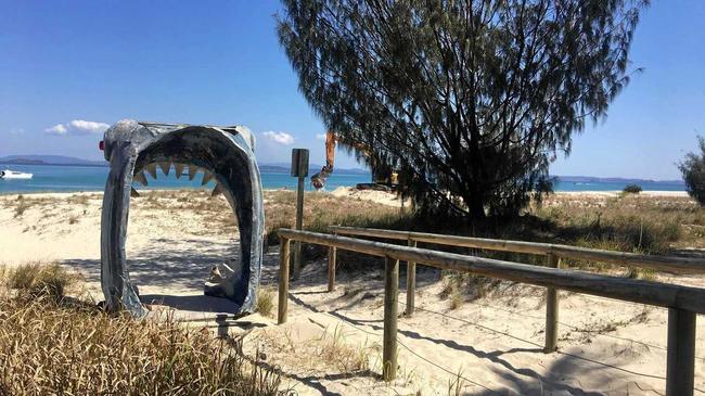 DUNES GOING: Sand dunes are being dug up close to shops and walkways on Fisherman's Beach on Great Keppel Island to use for sandbags on Putney Beach to save Great Keppel Island Hideaway and Putney Beach. Picture: Kiha Bonney