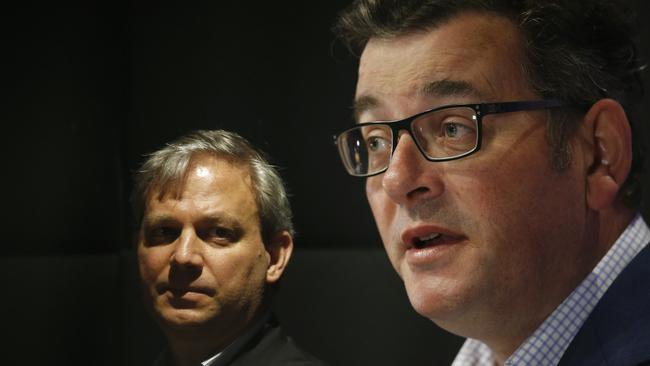 Victorian Chief Health Officer Brett Sutton (left) looks on as Victorian Premier Daniel Andrews provides a COVID update. Picture: NCA NewsWire / Daniel Pockett