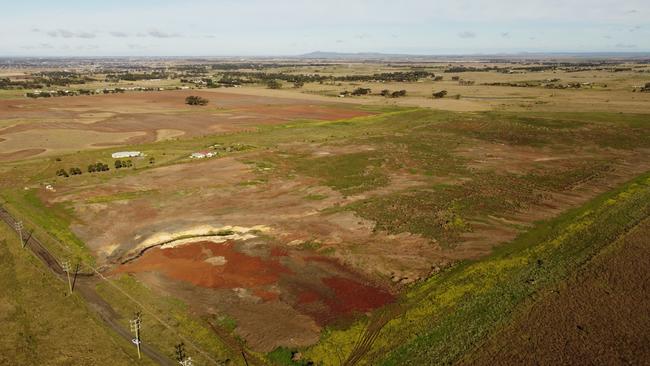 Soil covers land previously home to native grasslands at a conservation site in Truganina. Picture: Adrian Marshall